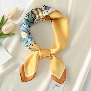 Detail of satin scarf featuring vintage scooter illustrations and tulip floral background