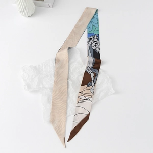 Close-up of double-sided silk twilly featuring artistic horse print and wave pattern