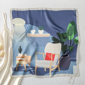 Macro shot of satin silk scarf with deep blue art illustration and white chair pattern