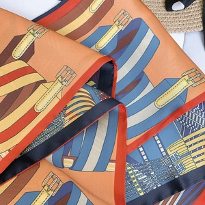 Detailed macro view of vibrant digital ink art print on soft silky decorative neck scarf