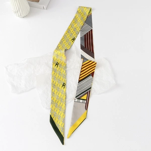 Detail of silk-feel skinny scarf with chain pattern, geometric prints and letter R