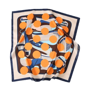 Floral satin scarf with navy boat and orange polka dot prints in a soft silk style