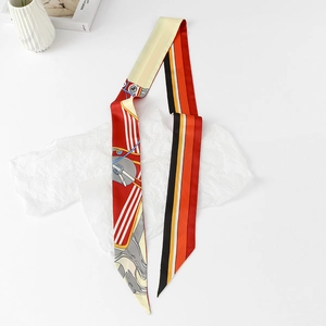 Detailed view of long silk twilly scarf with vibrant equestrian prints and patterns
