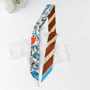 Detailed view of a slim floral twilly scarf with cartoon print and striped patterns