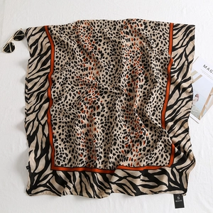 Lightweight leopard and zebra print shawl with bright orange borders for women