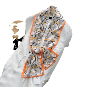Elegant long satin scarf with ink-painting chain print and orange border on white blazer