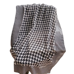 Classic black and white houndstooth cotton linen shawl with stylish fringe texture