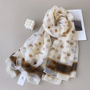 Lightweight cream polka dot beach scarf and sun protection shawl with brown borders