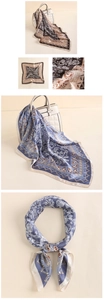 Detail of vintage square silk scarf with paisley pattern and golden borders on a handbag