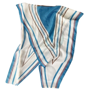 Minimalist blue and white striped silk scarf with diagonal V-shaped patterns and brown edges