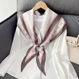 Elegant white long sleeve shirt featuring a pink striped silk scarf with H pattern