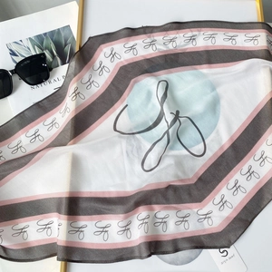 Elegant lightweight striped silk scarf with geometric patterns and logo for spring and summer