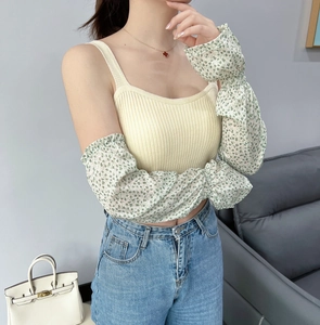 Floral chiffon sun protection sleeves with yellow ribbed knit tank top on model