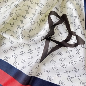 Elegant magnolia silk scarf with vintage geometric prints and red-blue stripes pattern