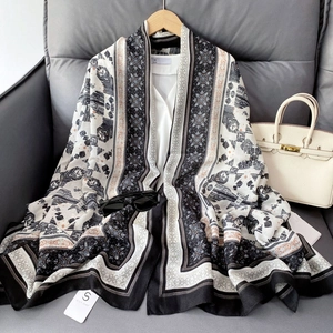 Close-up of geometric ethnic pattern on lightweight cotton-linen feel shawl fabric