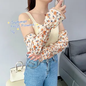 Floral chiffon sun protection arm sleeves with orange blue flowers and ruffled cuffs