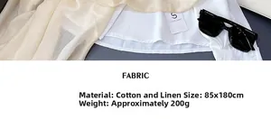 Détail d'écharpe beige en coton et lin 180x85cm avec texture tissée sur chemise