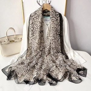 Elegant camellia print silk scarf in lightweight breathable chiffon for beach and resort wear