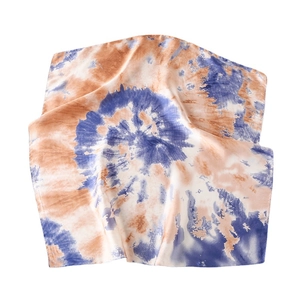 Tie-dye printed silk square scarf with orange and blue spiral pattern in vintage style