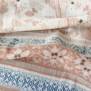 Bohemian style cotton-linen scarf with geometric patterns in pink and blue