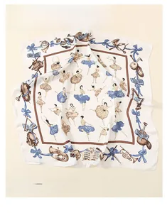 Détail d'un foulard en soie satinée avec motifs élégants de ballet et d'instruments