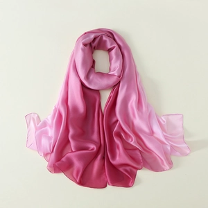 Elegant gradient pink silk scarf with smooth satin luster and graceful drapes for women