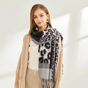 Elegant leopard print scarf for women in soft faux cashmere with fringe details