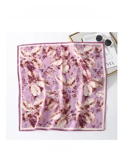Detail of lavender square silk scarf with brown leaf patterns and beige edges