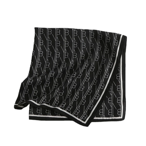 Elegant black silk scarf featuring white B-letter patterns and striped borders for women