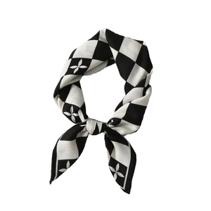 Elegant black and white checkerboard velvet scarf with clover pattern floral detail
