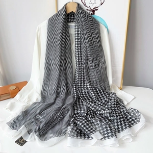 Elegant houndstooth and zigzag print long chiffon scarf styled on white shirt