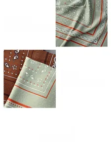 Detail view of sage green paisley print silk scarf with fine stitching and star motifs