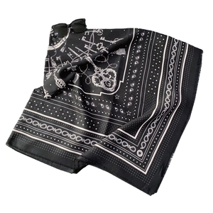Elegant black silk scarf with white vintage key patterns and delicate fringe borders