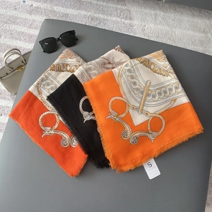 Fashionable equestrian horse print scarves with fringe and luxury orange patterns