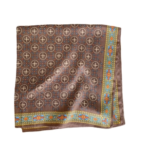 Brown silk scarf with gold cross pattern and vibrant geometric braided border
