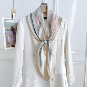 Elegant multi-color diagonal stripe silk scarf with letter print on white blazer