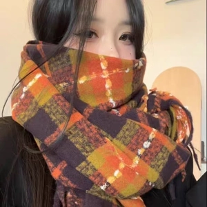 Cozy checkered scarf with orange and purple plaid patterns and fringe tassels
