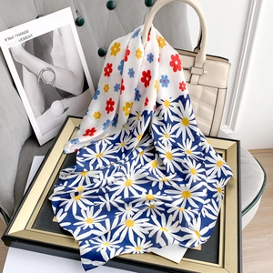 Silk-like floral scarf with white daisy print on navy blue and white background