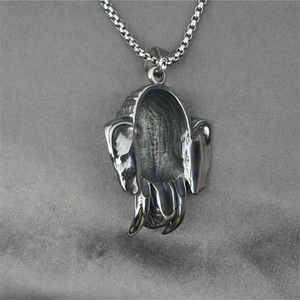 3D silver elephant skull titanium steel pendant with square chain on grey texture