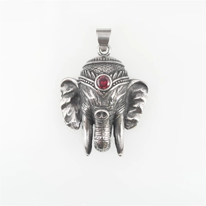 Vintage 3D elephant pendant necklace in stainless steel with a red gemstone eye inlay