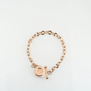 Minimalist rose gold titanium chain bracelet with heart-shaped toggle clasp and engraving