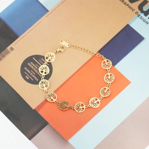 Bracelet en acier titane doré avec pendentifs arbre de vie et fermoir mousqueton réglable
