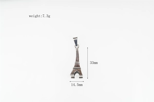 Detailed view of Eiffel Tower pendant showing 33mm height and 7.3g weight specifications