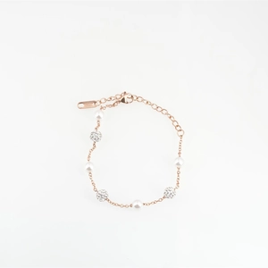 Bracelet en titane rose gold avec perles alternées et billes de cristal étincelantes