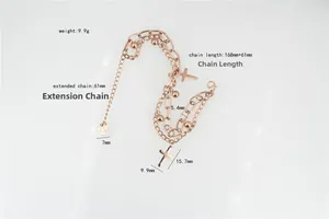 Detail view of multi-layer rose gold bracelet with cross and heart charms, showing dimensions