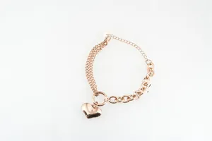 Detail view of rose gold heart bracelet showing 162mm length and 15.7g weight specs