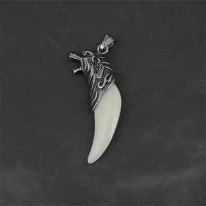 Retro punk style wolf head pendant necklace with silver finish and ivory tusk charm