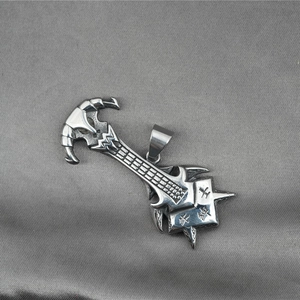 Vintage rock guitar pendant in distressed stainless steel on textured grey background