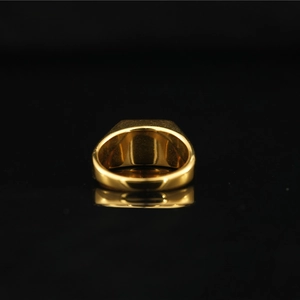 Polished 18K gold signet ring for men with side cut minimalist luxury design