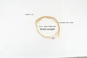 Double-layered gold chain bracelet with crystal pendant and adjustable clasp, 3.1g